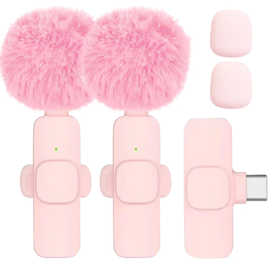 Pink fluffy phone grip and stand with USB connector on a white background